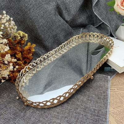 China Morden Style Luxury Nordic Home Decorate Mirror Tray Ellipse Handcraft Gold Metal Mirror Serving Tray for sale