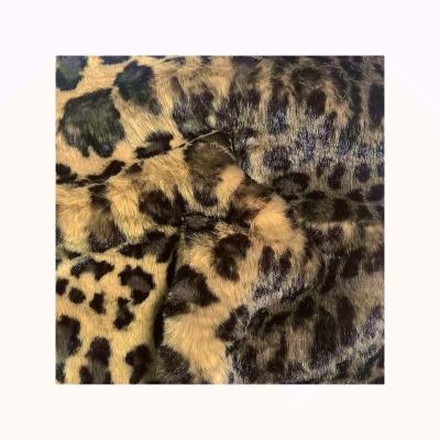 China Toy Best Quality Super Soft Leopard Pattern Design Coat Fur Animal Print Fabric for sale