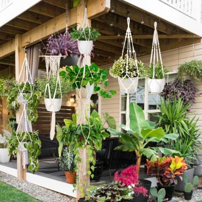 China Bohemian Christmas Decoration Flower Potted Plant Holder Macrame Plant Indoor Outdoor Hanger for sale