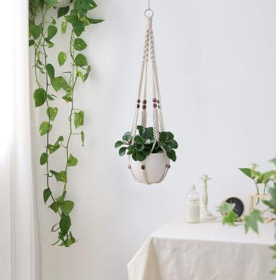 China Bohemian Home Decoration Cotton Macrame Plant Hanger Indoor Handmade Plant Hanger for sale