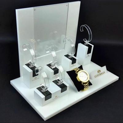 China Custom Wholesale L Position Classy Flat Shape Showcase Counter Acrylic Exhibition Display Stand For Watch Stand Holder for sale