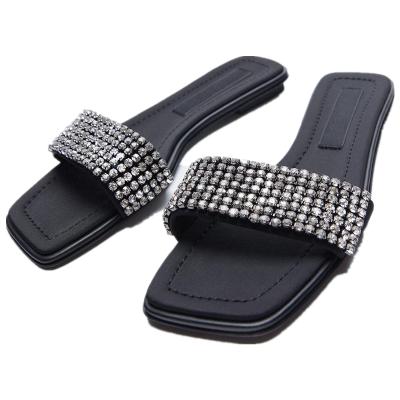 Китай 2021 Wholesale New Summer Diamond Women's Shoes Europe And America Shiny Black Diamond Open Toe Flat Women's Slippers Sandals продается