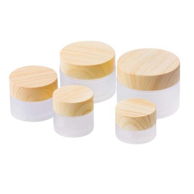 China Personal Care 5g 10g 15g 30g 50g 100g Empty Cosmetic Cream Jar Container With Wood Grain Lid For Cosmetics for sale