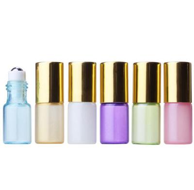 China Personal Care 3ml Colorful Essential Oil Roll On Fancy Matte Glass Bottle Roll On Perfume Bottle Sample With Gold Silver Cap for sale