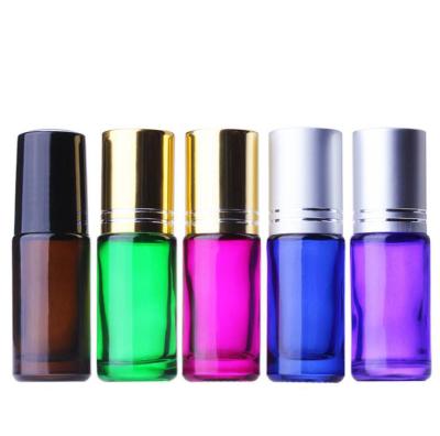 China Personal Care Free Sample Thick Amber Blue Green Pink 5ml Roll On Bottle With Stainless Steel Trackball for sale