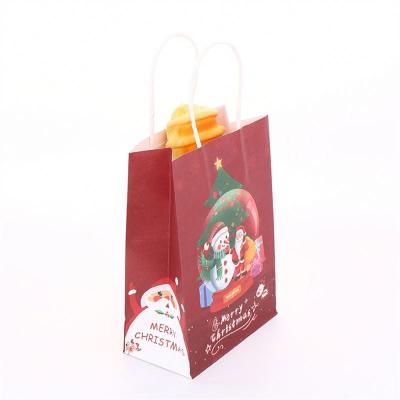 China Custom Apparel Printed Red Black Christmas Disposable Candy Paper Carry Bags 120Gsm Brown Apparel Packaging for sale