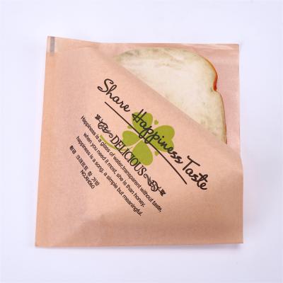 China Food Oil Proof Triangle Sandwich Toast Bag Hand Grab Greaseproof Cake Customized Packaging Bag for sale