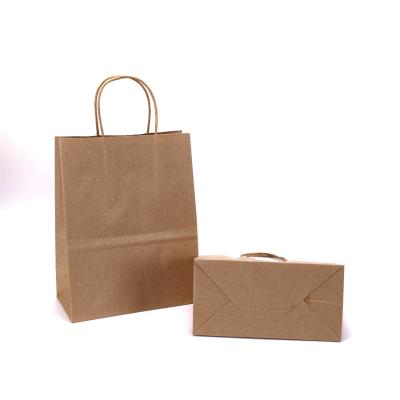 China Brown Gifting Hand Kraft Paper Disposable Paper Shopping Bags With Handle Bag Paper Bag Manufacturer for sale