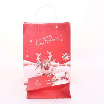 China Fancy Designed Eco Friendly Disposable 120Gsm 24pcs Handle Custom Large Logo Printing Kraft Christmas Paper Bags for sale