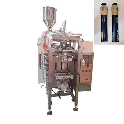 China Factory Price Food Honey Oil Energy Drink Water Sachet Stick Filling Packaging Machine With Round Corner Teardrop Notch for sale