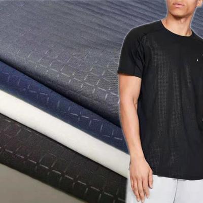 China New design anti pill stretch quick-drying fabric, plaid embossed t-shirt knitted fabric, sports quick-drying drifit knitted fabric for sale