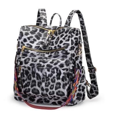 China Waterproof Customized Printing Waterproof Women's Leopard PU Bag Backpack Schoolgirl Anti-theft Backpack for sale