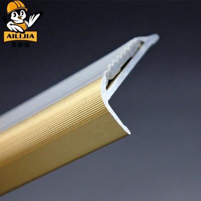 China Hotel PVC Gold Aluminum Anti - Slip Stair Tread Nosing For Laminate Flooring for sale