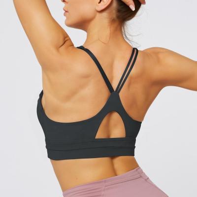 China Fashion antibacterial design padded sports bra women quakeproof beautiful strappy back sports bra fitness bra for sale