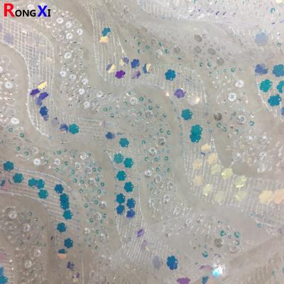 中国 RXF0917 Snow Embroidery Sequin Fabric 3mm Customizable Medium Weight 販売のため