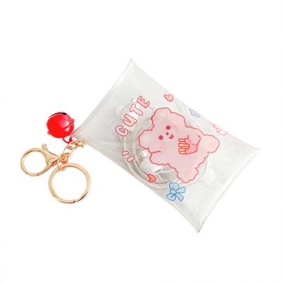 China Durable Wholesale Girls Bell Key Chain Clear PVC Bags Custom Mini Cute Cartoon Coin Purses for sale