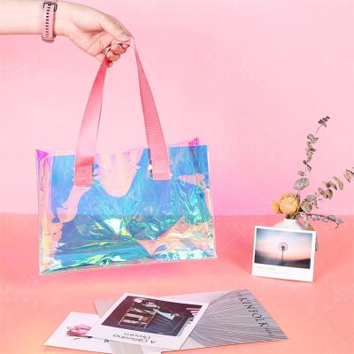 China Good Quality Lady PVC Durable Holographic Nylon Handle Bag Pink Waterproof Duffel Bag Women for sale