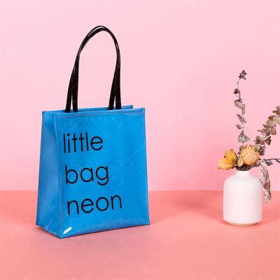 China Fashion Durable Bag For Woman Customized Shopping Bag With Logo Handle PVC Jelly Duffel Bag for sale