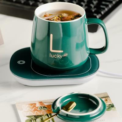 China 2022 Wholesale 55 Degree Heating Water Cup Electric Heavy Duty Wireless Hot Cup Wireless Charger Viable Ceramic Mugs With Gift Packing for sale