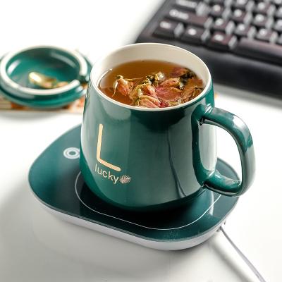 China 2022 Creative Viable Heat Preservation Cup Warmer USB Electric Heated Coffee Wireless Thermostat Keep Coffee Cup Warm With Gift Packing for sale