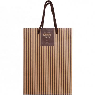 China Manufacturer Recyclable Wholesale Taiwanese Kraft Paper Candy Gift Shopping Bag With Handle for sale