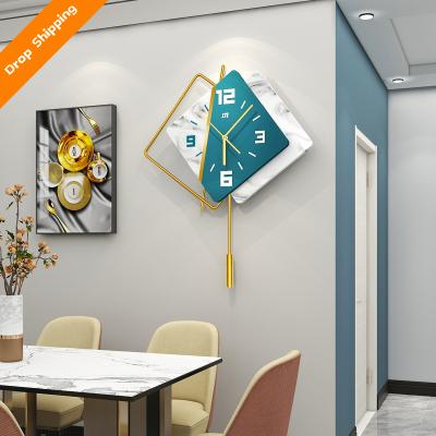 China The new creative home decoration art drop clock one drop delivery classical/postmodern light luxury living room wall clock Te koop