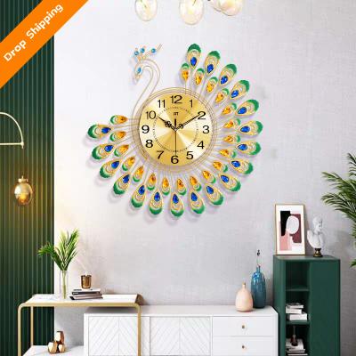 China New classic/postmodern factory direct sales synchronize simple peacock living room wall clock home decoration clock hanging creative Te koop