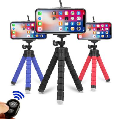 China Universal Mobile cheap price feifie stick in tripod with flexible phone holder /Gimbal selfie stick with wireless remote for sale