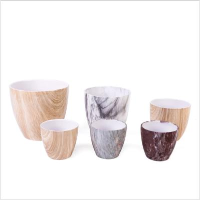 China wholesale cheap outdoor garden plant plastic white flower pots round plastic flower pots Bump-resistant for sale