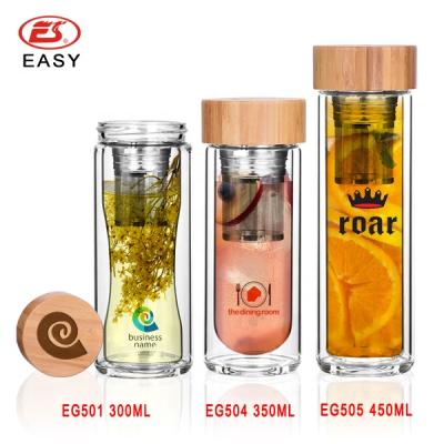 China Sustainable Promotional High Borosilicate Double Wall Glass Water Tea Bottle To Go BPA Free Glass Drinking Bottle With Bamboo Infuser Lid for sale