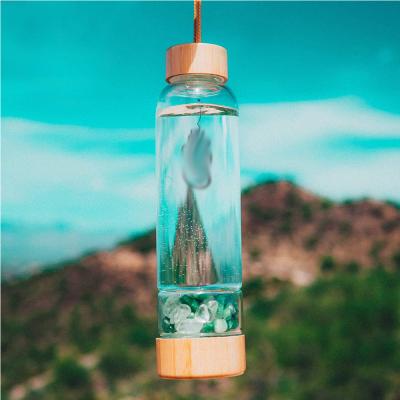 China 2021 Amazon Viable Hot Selling Bpa Free Reusable Gold Gemstone Cup Infuser Sports Glass Crystal Water Bottle for sale