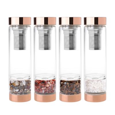 China 2021 Viable Gemstone Tea Glass Water Bottle Infuser Rose Gold Lid Water Bottles with Crystal Inside for sale