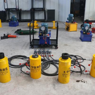 China Stainless Steel Prestressed Hydraulic Cylinder Jacks /50T Tension Hydraulic Jack 100 Tons Max Red Customized Color for sale