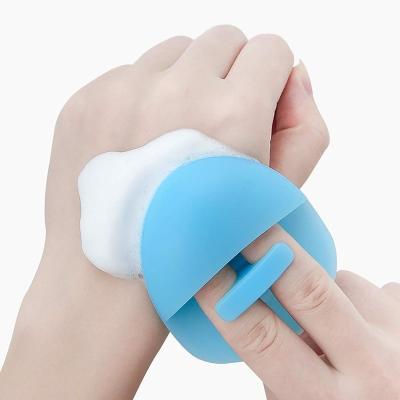 China Manual Handheld Facial Massage Brush Food Grade Silicone Mini Facial Exfoliating Brush Massager Handheld Mat Scrubber Cleaning Brush for sale