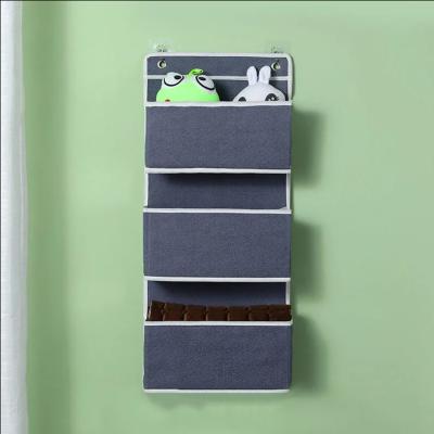 China Sustainable Houseware Pocket Over The Door hanging shelf organizer storage hanging bag 3 layer portable wardrobe storage for sale