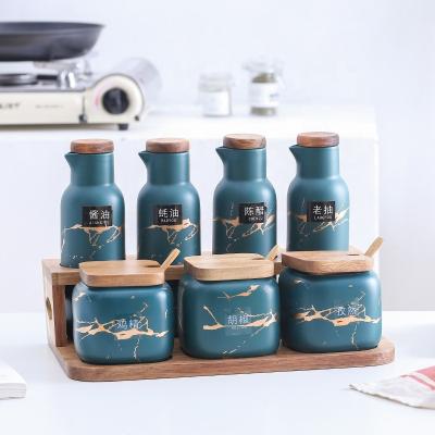 China Stored Oil Dispenser Salt Cellar With Lid Sugar Container Storage Jars For Spices Ceramic Condiment Set for sale