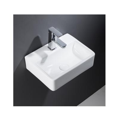 China Modern Quality Guaranteed Unique Bathroom Sinks Modern Ceramic Table Top Designer Wash Basin for sale