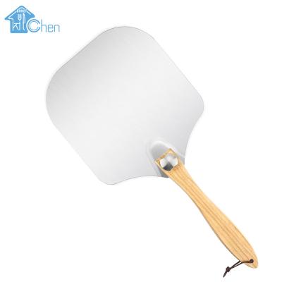 China Viable Hot Sale Wooden Handle Amazon Pizza Peel Aluminum Pizza Cutter Kitchen Supplies for sale