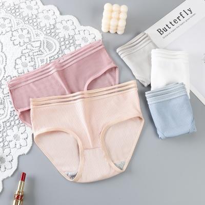 China Korean student version of Japanese women's underwear QUICK DRY breathable sexy and cute cheap women's solid color waist girl panties for sale