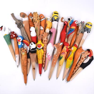 China Pen Wholesale Promotional Animal Wooden Pens Burning Wood Carving Ballpoint Pen for sale