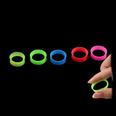 China Multicolor Flexible Silicone Glow In The Dark Ear Stretcher Silicone Ear Tunnel Piercing for sale