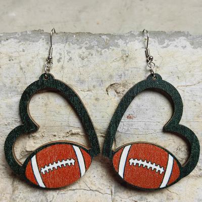 China New Design Heart Shape Football Sports Fashionable Rugby Hollow Out Baseball Wooden Football Earrings for sale