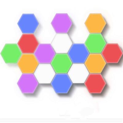 China Modern Stylish Creative Honeycomb Touch Night Lamps LED Hexagon Quantum Modular Wall Lights for sale