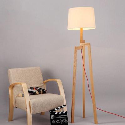 China Modern Best Selling Solid Wood Fabric Round Shade Position Tripod Nautical Floor Lamp for sale