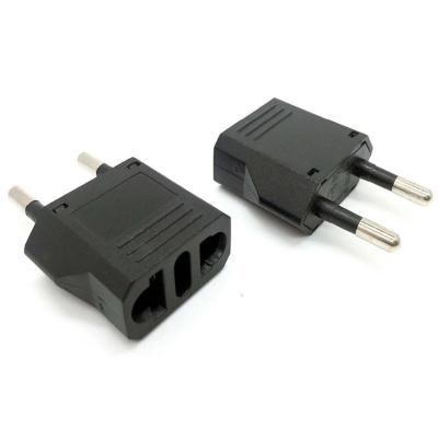 China Convenient US to EU 2 flat pin to 2 round adapter plug 110v to 220v voltage converter steckdosenleiste Eu for sale