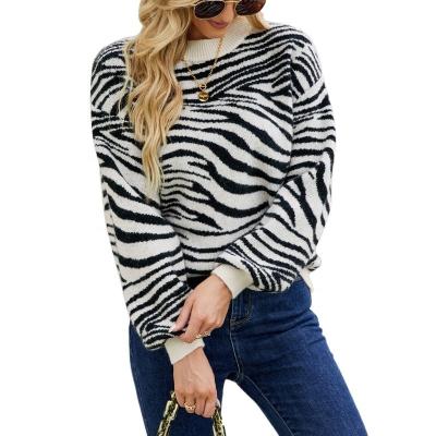 China Anti-wrinkle Women's sweater custom fashion street lantern sleeve autumn/winter casual round neck color clash zebra tiger print knit top for sale