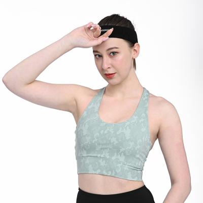 China Women Breathable Back Top Shockproof Running Yoga Crop Camouflage Seamless Bra for sale