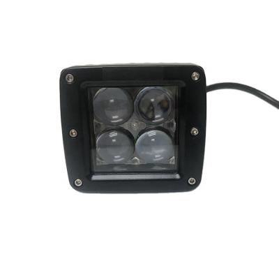 China Die-casting Aluminum Housing Car LED Running Light YD1212 4D 12W LED Headlight Super Bright Cube Offroad Light for sale