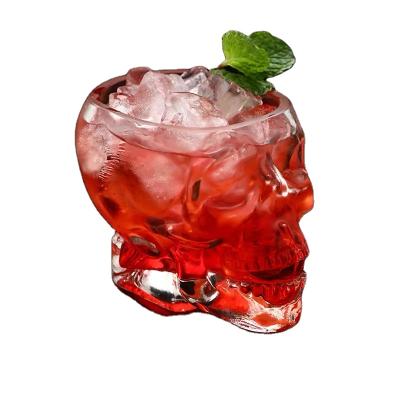 China Personal care factory wholesale creative cocktail and whiskey glass skull shaped glass cup for bar for sale