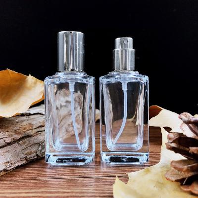 China 30ml 50ml 100ml Square Luxury Personal Care Perfume Clear Glass Cosmetic Spray Bottles China Manufacturer for sale